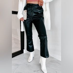 High faux leather flare pants. (Black) New Tags attached.